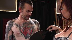 fat mistress dominates with anal strapon on bound slave