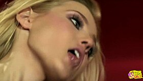 Fantasizing about lesbian play as blonde brings toy to brunette for wet fun