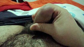 guy strokes cock to explosive cumshot during solo massage