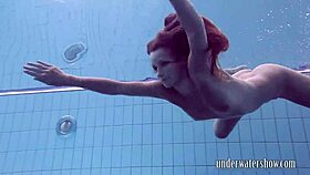 lucy teases by slipping off bikini underwater in pool bath