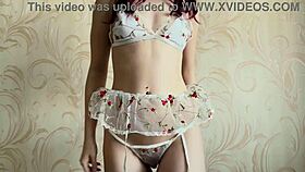 skinny redhead amateur teases in white lingerie and skirt