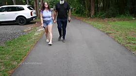 Nerdy milf strokes and sucks big black dick outdoors