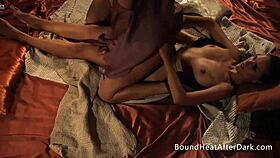 mistress whips and strap-on fucks her two lesbian slaves