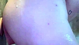 mmm peterwolfe stretches wide with huge pierced shower dildo 💦