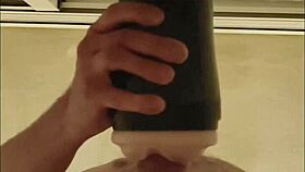 Guy pounds fleshlight shaking orgasm hits