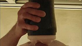 Guy pounds fleshlight shaking orgasm hits
