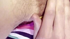 she nervously fingers her hairy wet pussy for the very first time on cam