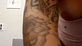 sexy redhead bares her perky tits and tight pink slit for viewers