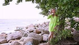 Sexy flexible ballerina in tight leggings seductively undresses on the sofa revealing small tits for erotic groping