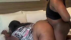 Remi bounces her wet ebony ass back on huge bbc in hotel room