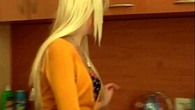 Babe rubs her pussy passionately right in the kitchen solo