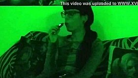 Beth's Kinky Goth Domina Smokes Hot in Green Light!