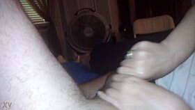 Two eager hands stroke massive cock waking up for intense homemade action