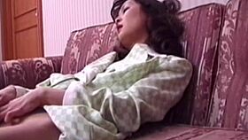 Japanese babe fingers her hairy pussy till she orgasms hard