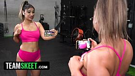 Sweaty oiled latina rides cock in gym gets cum on shaved tits